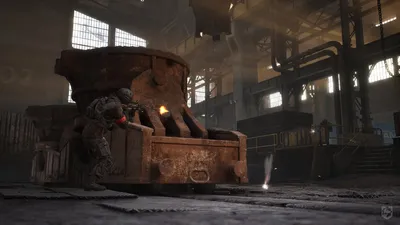 WARDOGS soldier firing from behind cover inside a rusted industrial foundry